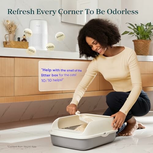 Woman using a litter box in a bathroom with an air purifier on the counter.