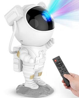 Astronaut-shaped projector lamp with remote control.