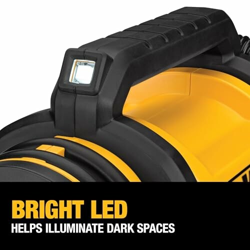 Bright LED work light with handle for illuminating dark spaces.