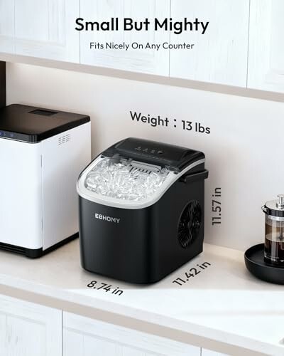Compact ice maker on countertop with dimensions displayed.