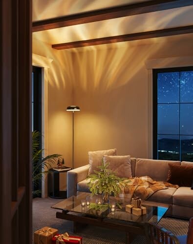 Cozy living room with a couch, lamp, and starry night view.