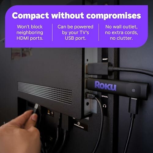 Roku streaming stick installed on TV with HDMI and USB connections.