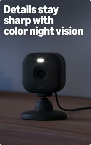Smart camera with color night vision on a wooden surface.