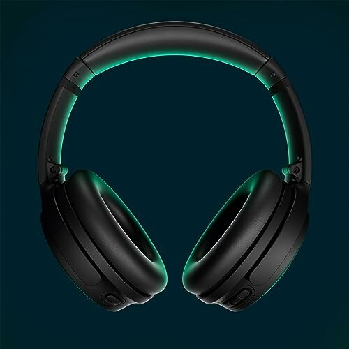 Wireless gaming headset with glowing green accents.