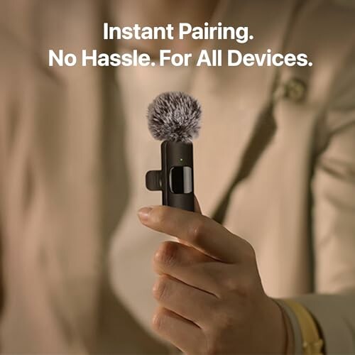 Person holding wireless microphone with text 'Instant Pairing. No Hassle. For All Devices.'